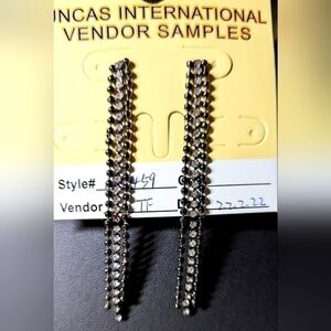 Uncas international earrings in black and crystal.Long and lovely.